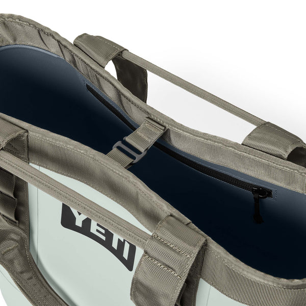 Close-up of a YETI cooler bag with a focus on the brand logo.
