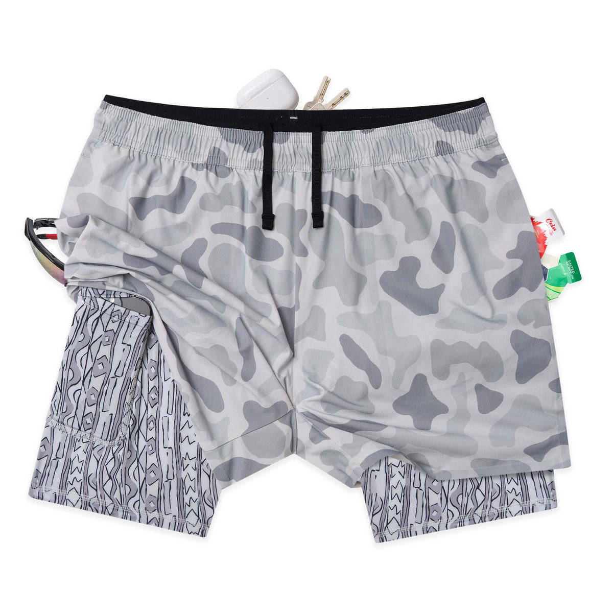 Front view of pastel grey camo performance shorts with elastic waistband and built-in printed compression liner.