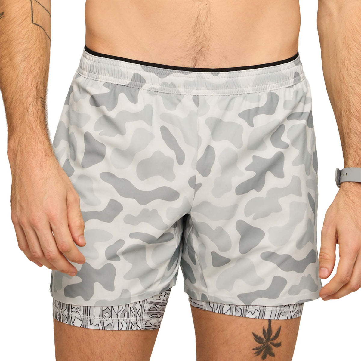 Front view of pastel grey camo performance shorts with elastic waistband and built-in printed compression liner.
