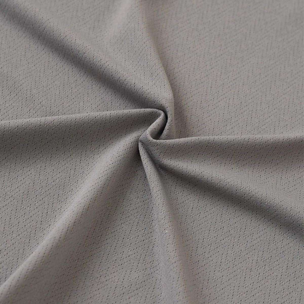 close up of material on The Steel Gray Rec Tee with moisture wicking, breathable features
