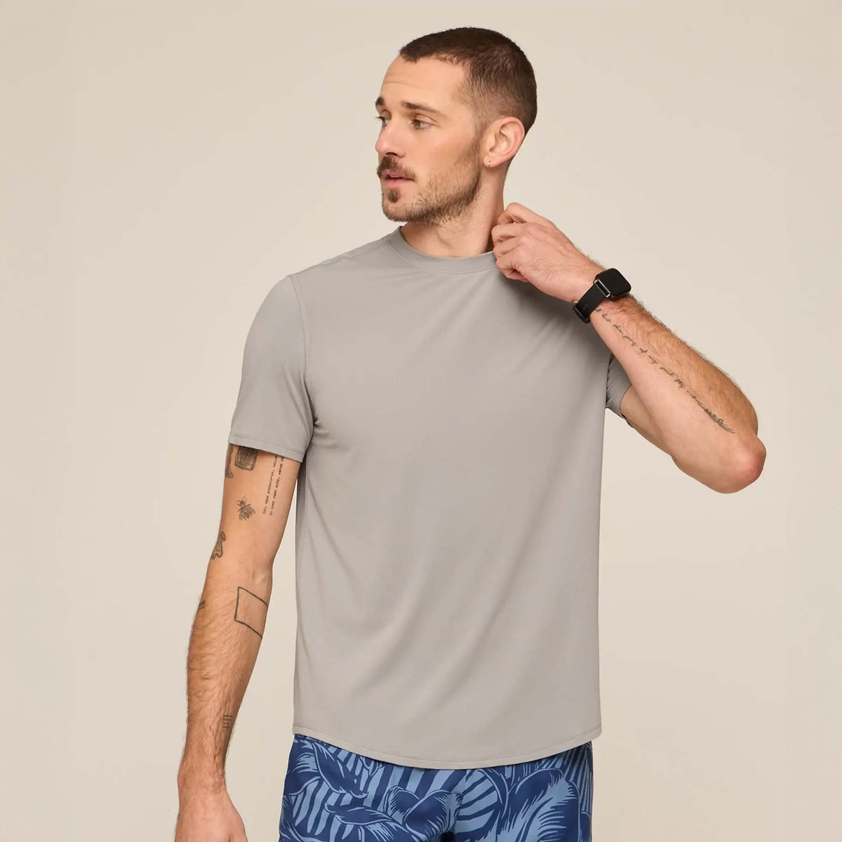 Front view of a Man wearing The Steel Gray Rec Tee with moisture wicking, breathable athletic material
