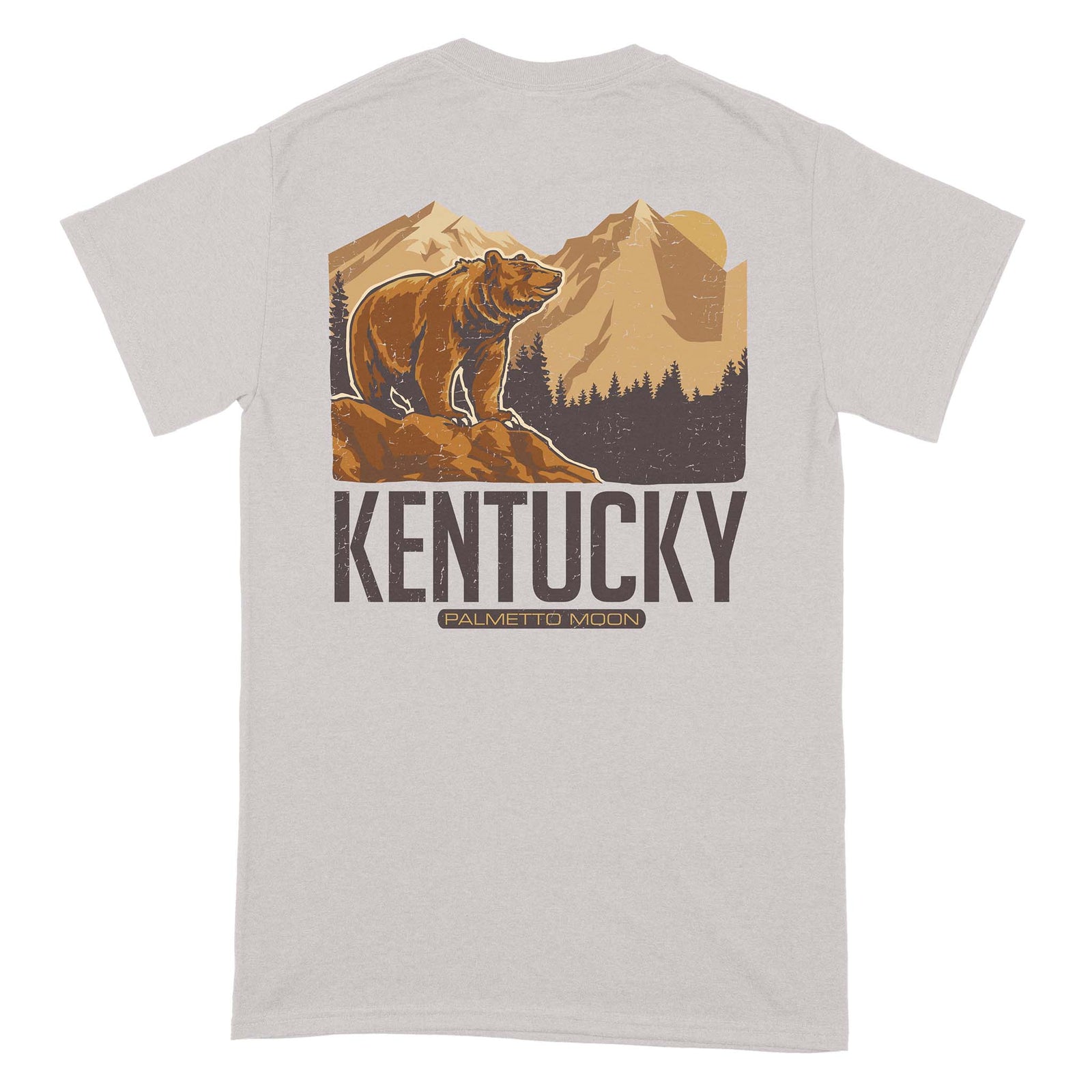 Back of light gray short sleeve t-shirt with brown bear graphic, mountain background, and large “Kentucky” text.