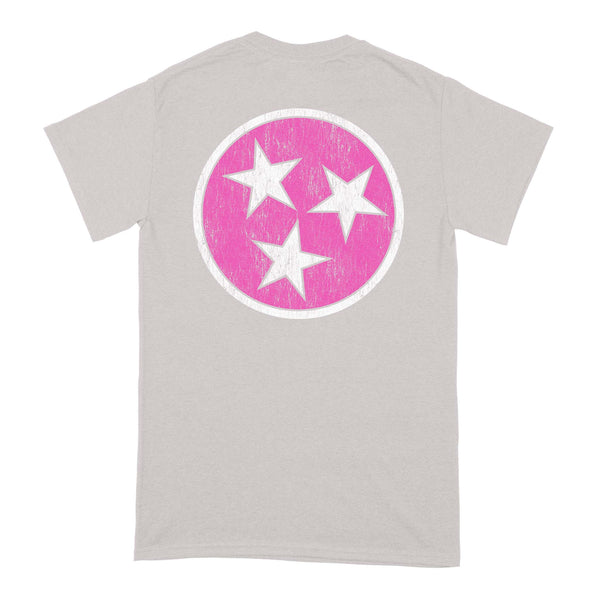  Back of light gray short sleeve t-shirt with large hot pink circle and 3 white stars in the middle.