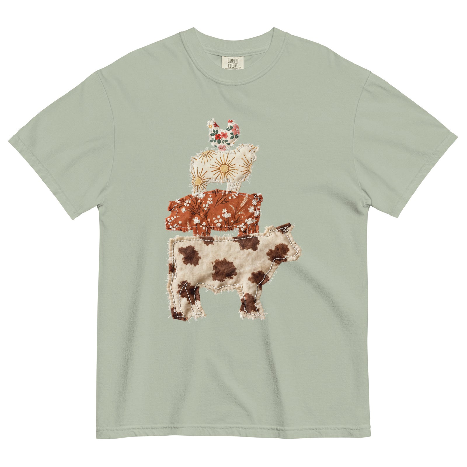 Light green t-shirt with a patchwork farm animal design on a white background