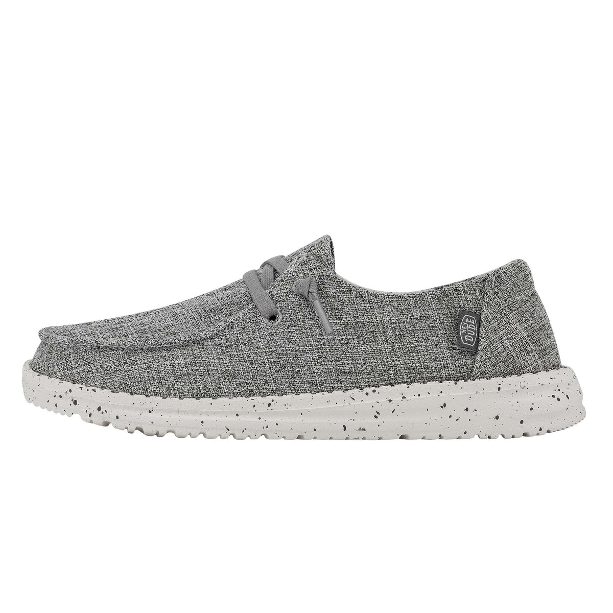 Gray casual shoe with speckled sole on a white background