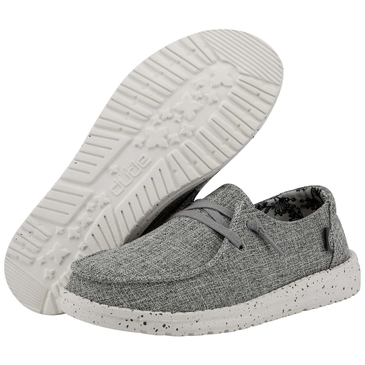 Gray casual shoes with white soles on a white background