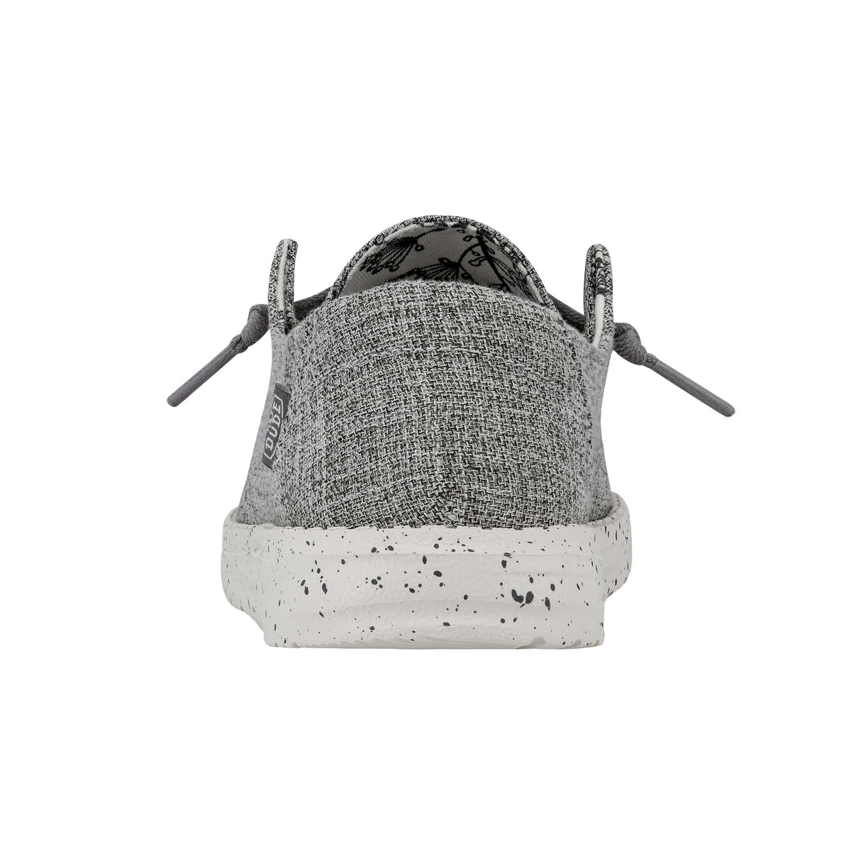 Gray sneaker with speckled sole on a white background