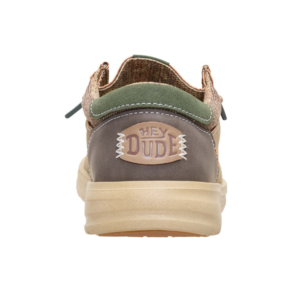 Sneaker with 'Hey Dude' logo on a white background