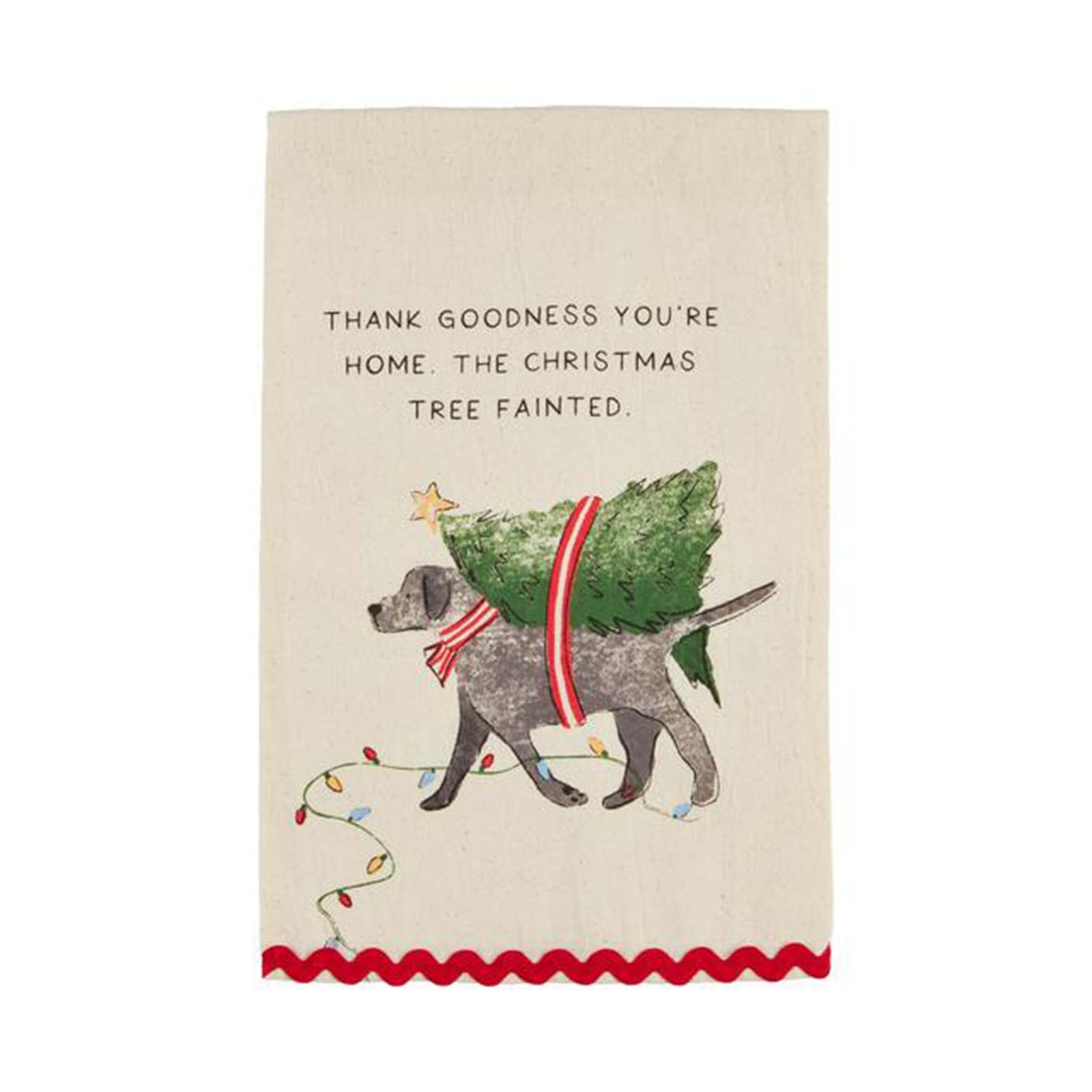 Kitchen towel with a christmas tree strapped around a dog and a saying that says Thank Goodness you're home, the christmas tree fainted.