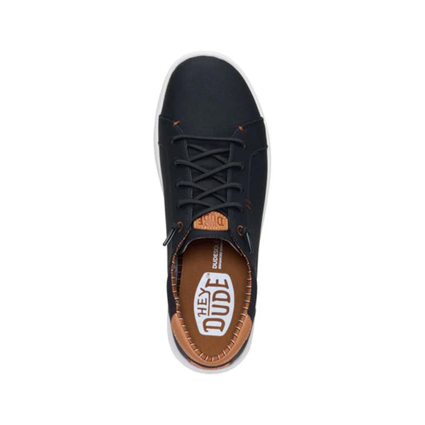 Top-down view of Hey Dude Men's Paul Pro Classic Shoes in Black with contrast interior and branding on insole.