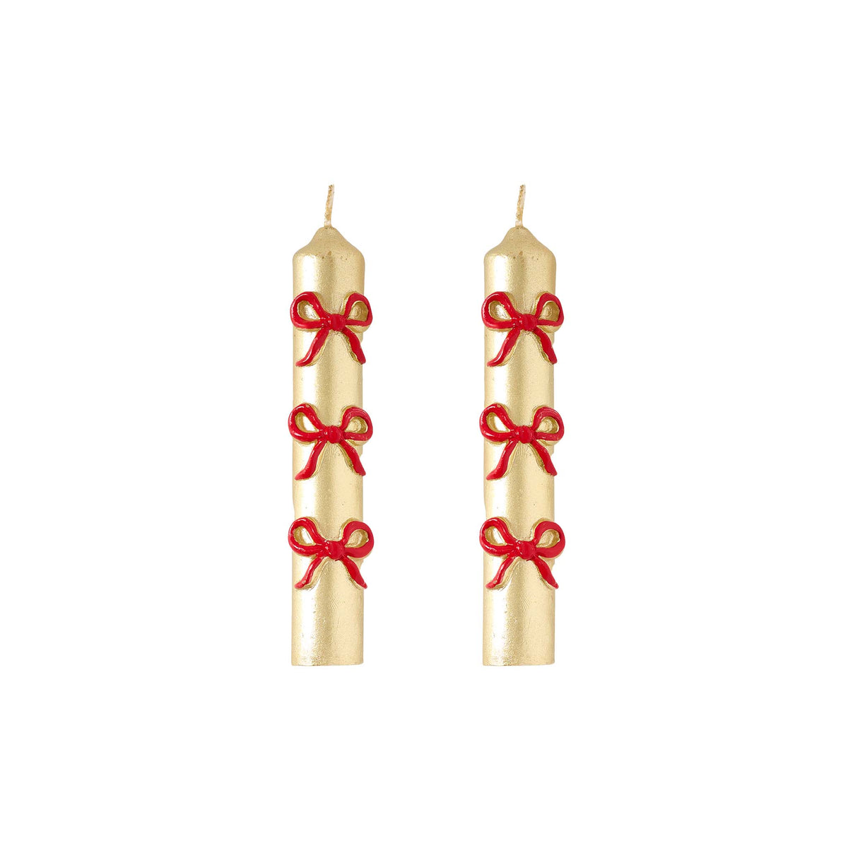 Two gold candles with red ribbons on a white background