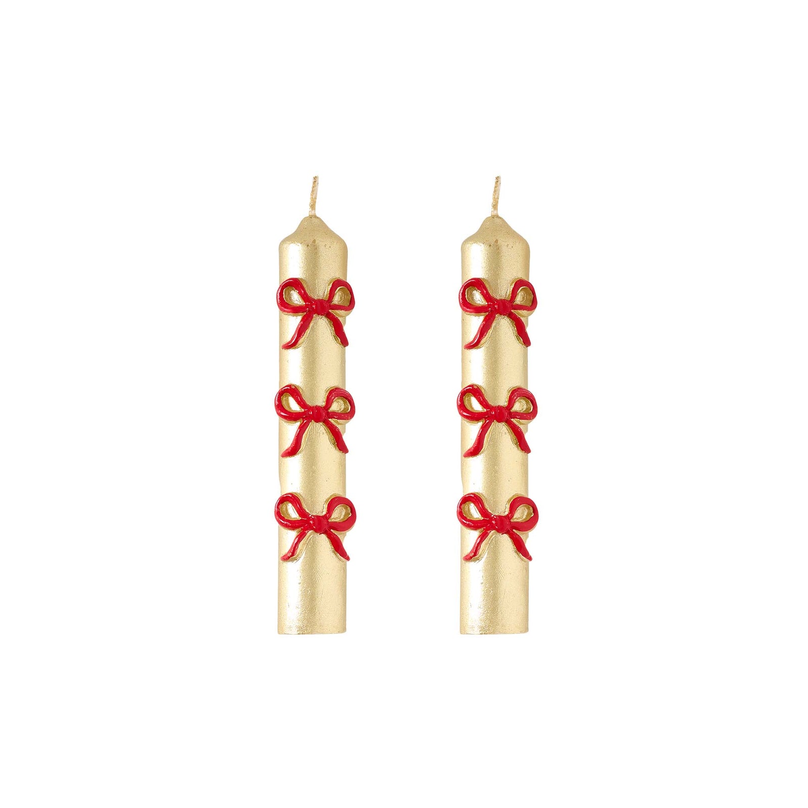 Two gold candles with red ribbons on a white background