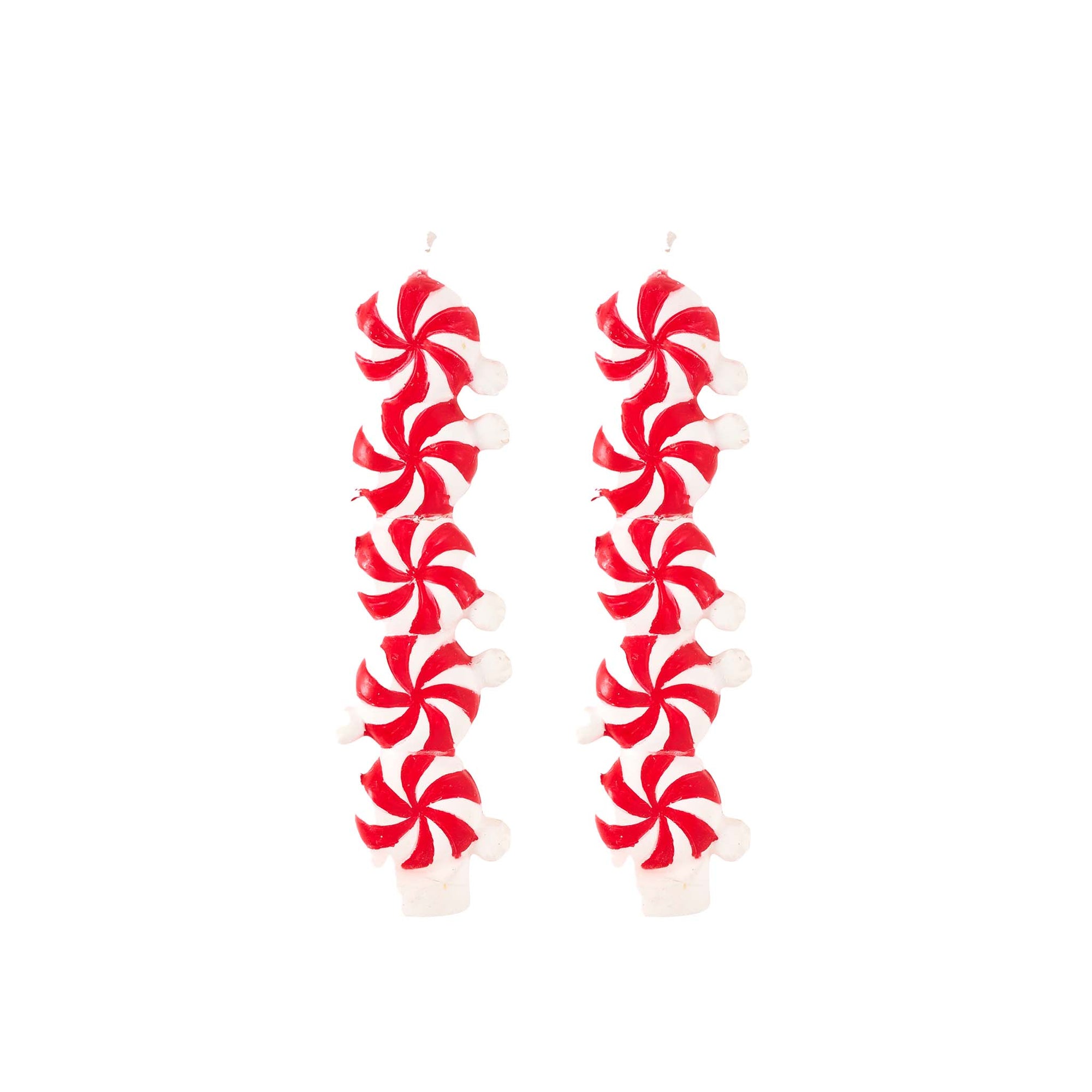 Red and white peppermint candy canes on a white background