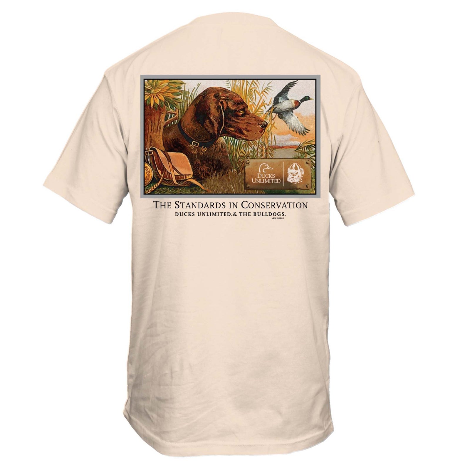 Back view of ivory Ducks Unlimited t-shirt with hunting dog and duck artwork, text reading “The Standards in Conservation.”