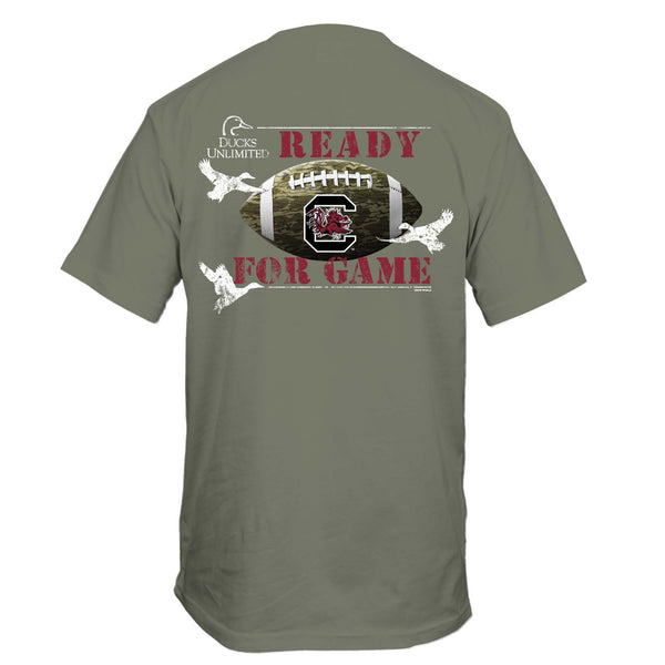 Military green short sleeve t-shirt with large graphic of a camouflage football with the South Carolina Gamecocks logo, flying ducks, and the words “Ready for Game” in red text.