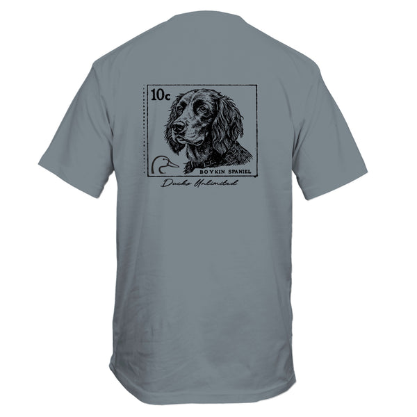 Gray t-shirt with a dog illustration and text on the back against a white background