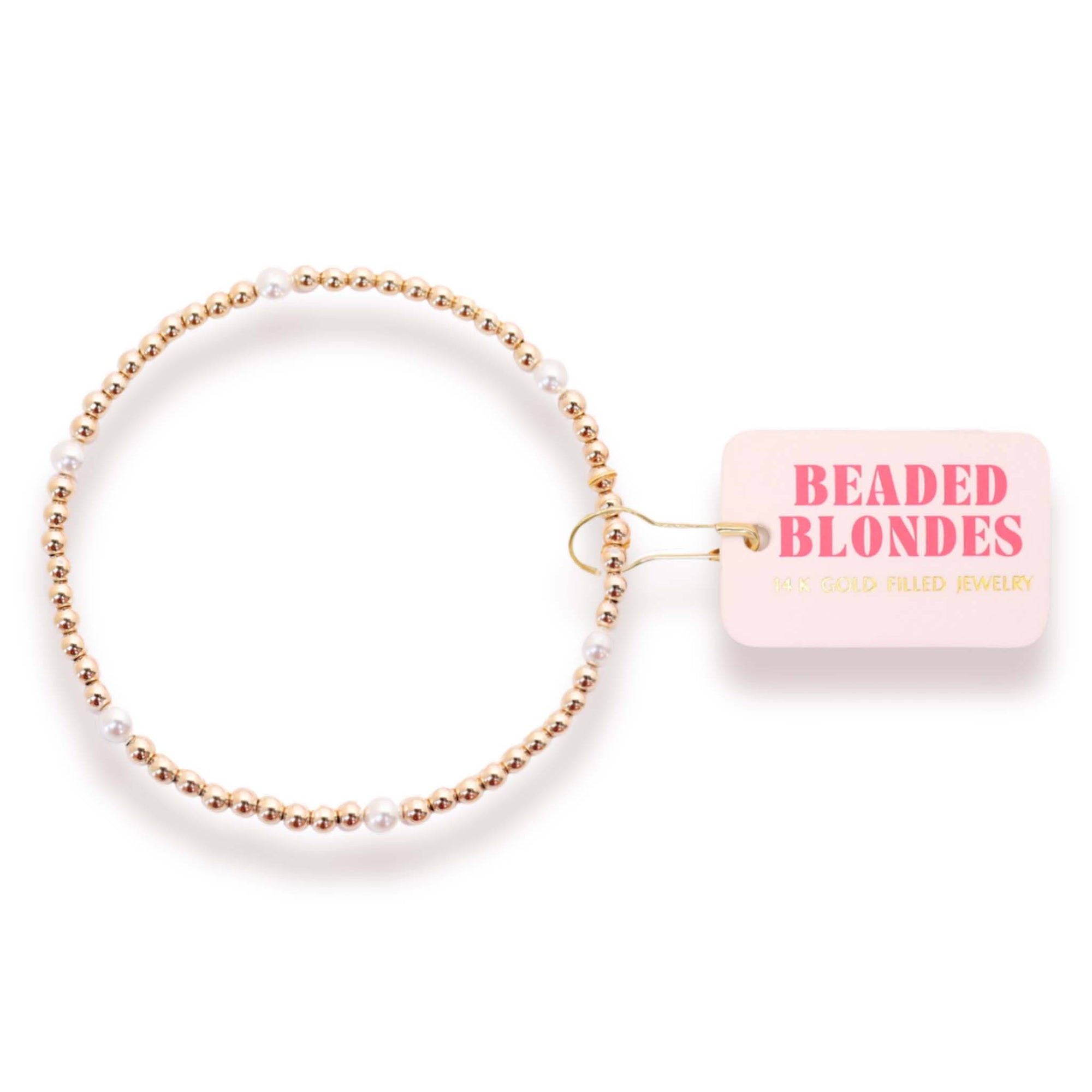 Beaded bracelet with 'Beaded Blondes' packaging on a white background