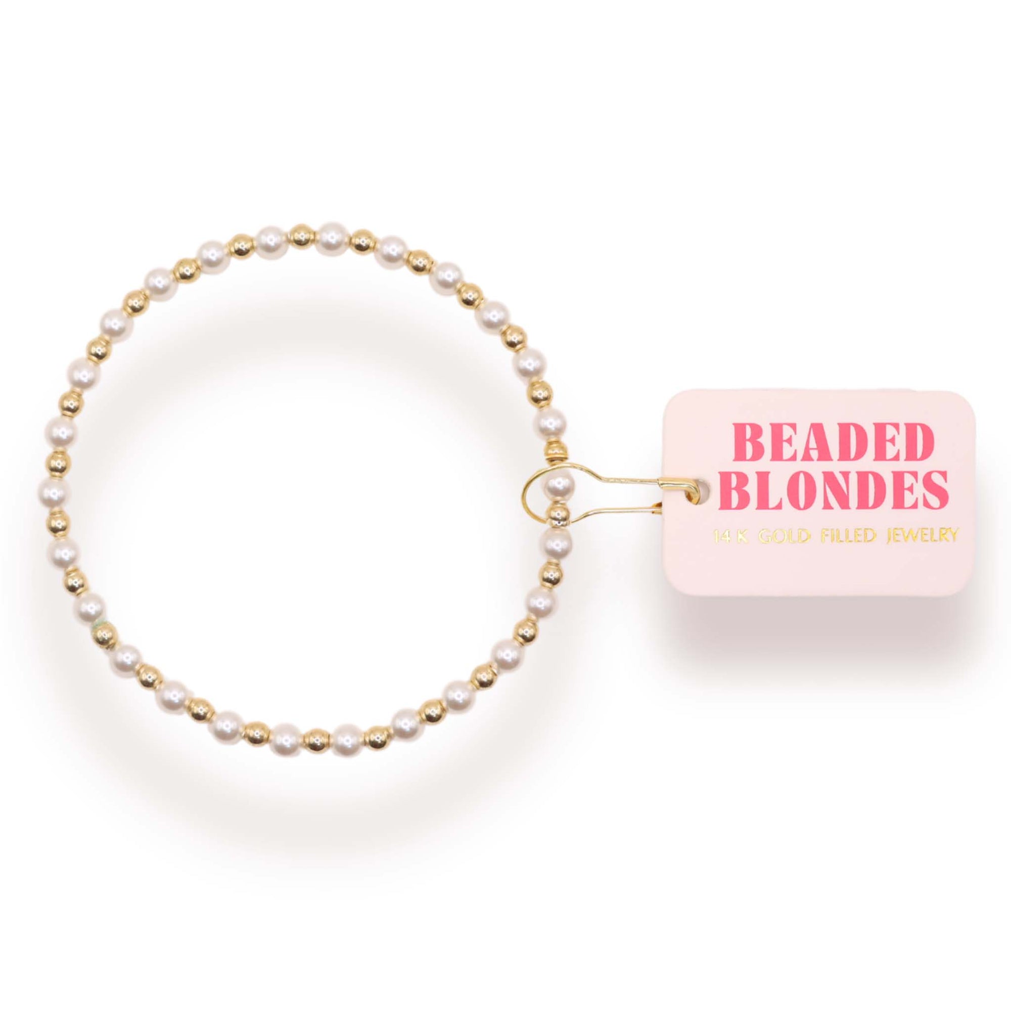 Beaded bracelet with 'Beaded Blondes' packaging on a white background