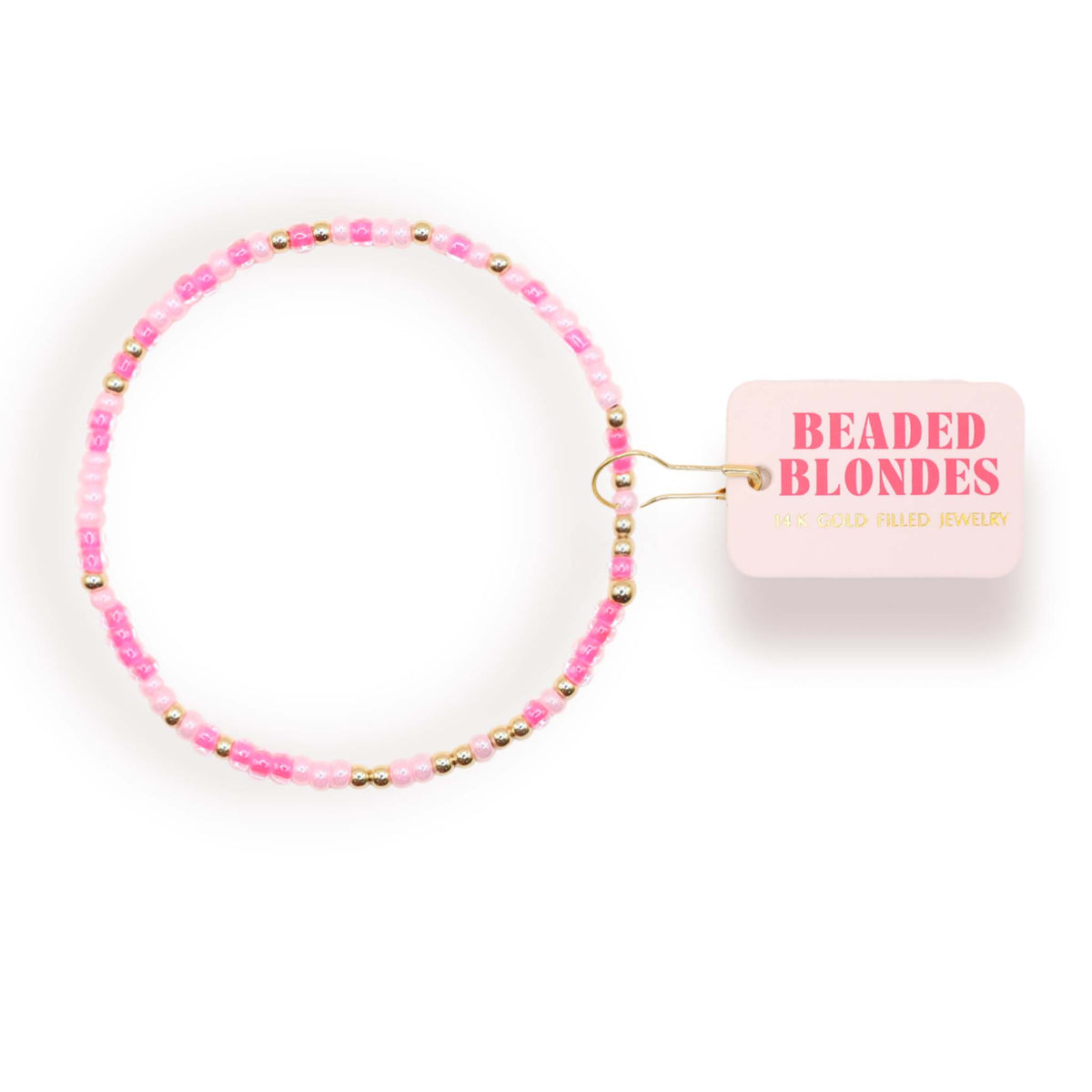 Pink beaded bracelet with 'Beaded Blondes' label on a white background