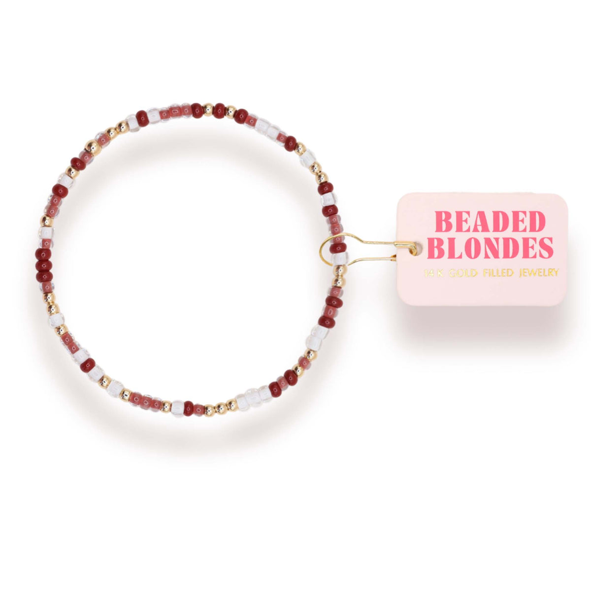 Beaded hair tie with 'Beaded Blondes' packaging on a white background