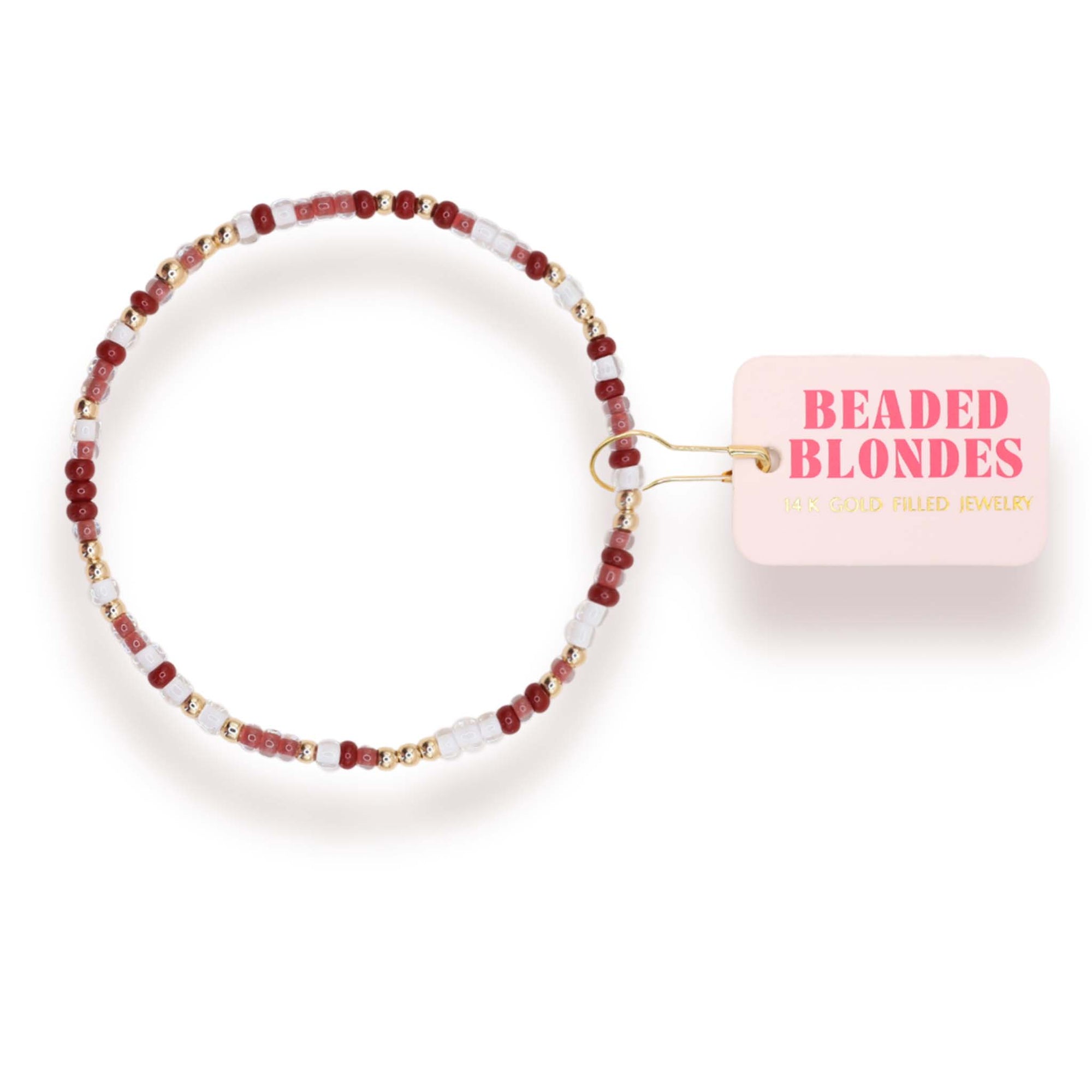 Beaded hair tie with 'Beaded Blondes' packaging on a white background