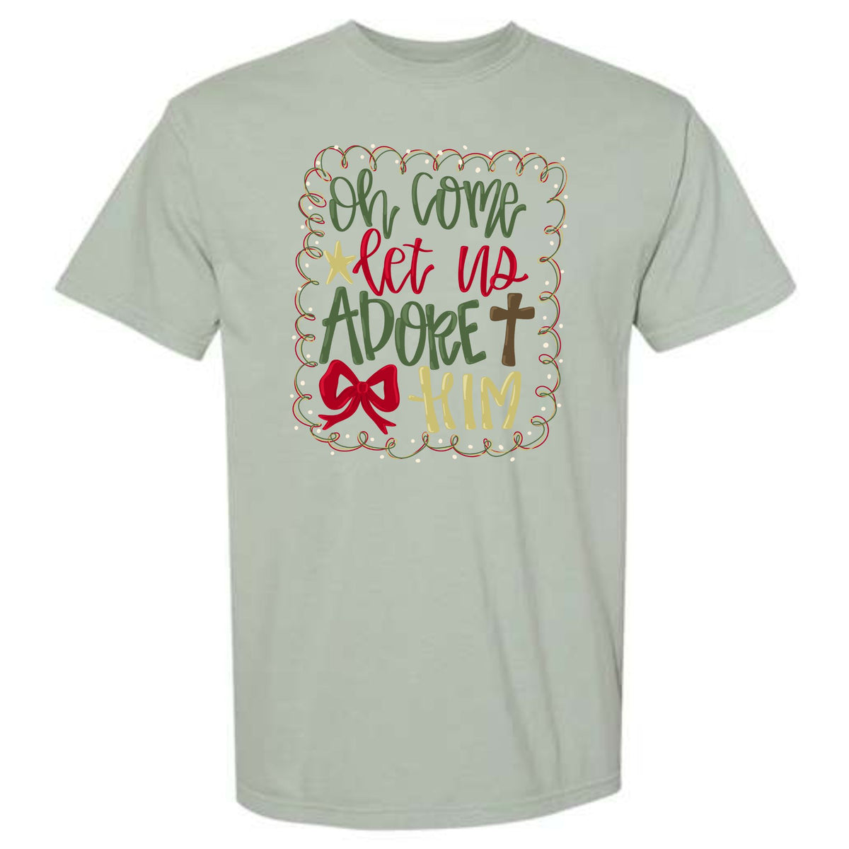 Bay green short sleeve t-shirt with festive “Oh Come Let Us Adore Him” text design in red, green, and gold with cross, star, and bow accents.