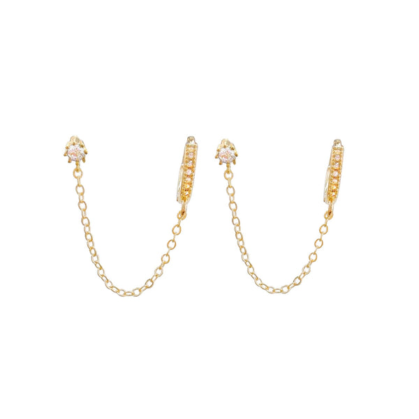 Gold chain earrings with crystal studs and double hoop design on white background.