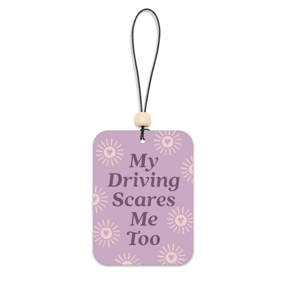 Purple rectangular air freshener with pink sunburst heart icons and text that reads “My Driving Scares Me Too,” attached to a black string with wooden bead.