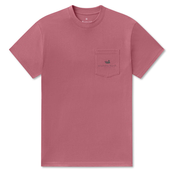 Washed red t-shirt with a pocket on a white background