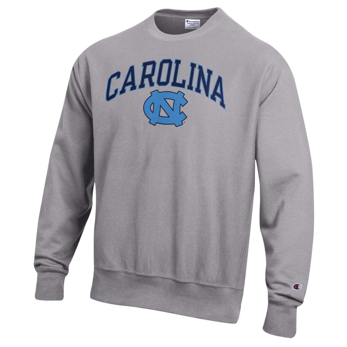 Gray UNC crewneck sweatshirt with navy “Carolina” text and light blue UNC logo on front, Champion logo on sleeve.