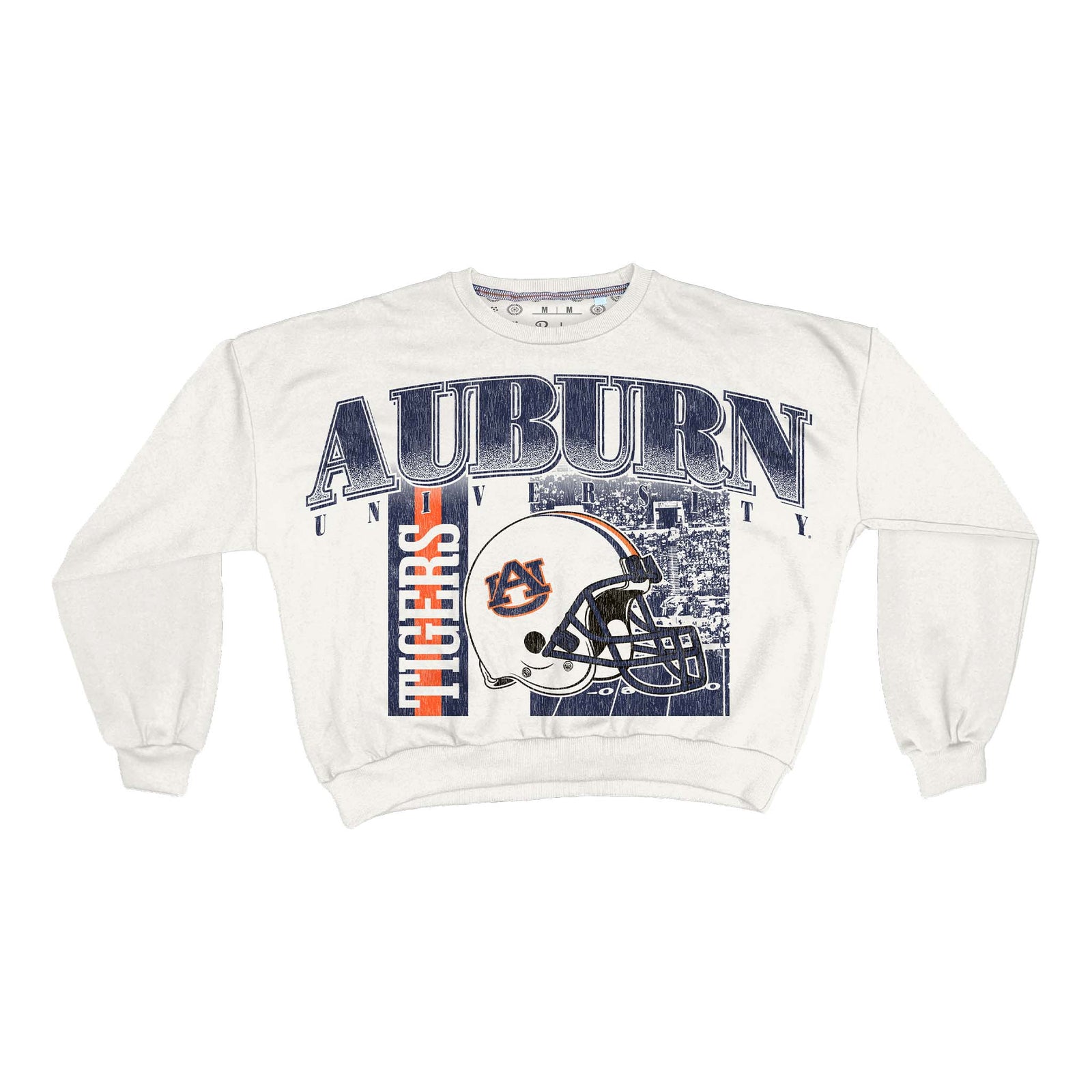 Front of white Auburn Tigers crewneck sweatshirt with large “Auburn University” text, football helmet, and stadium background graphic.