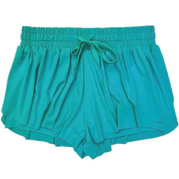  A pair of  teal blue women's flyaway shorts with an elastic waistband and built-in compression shorts, made from a stretch-nylon fabric blend.
