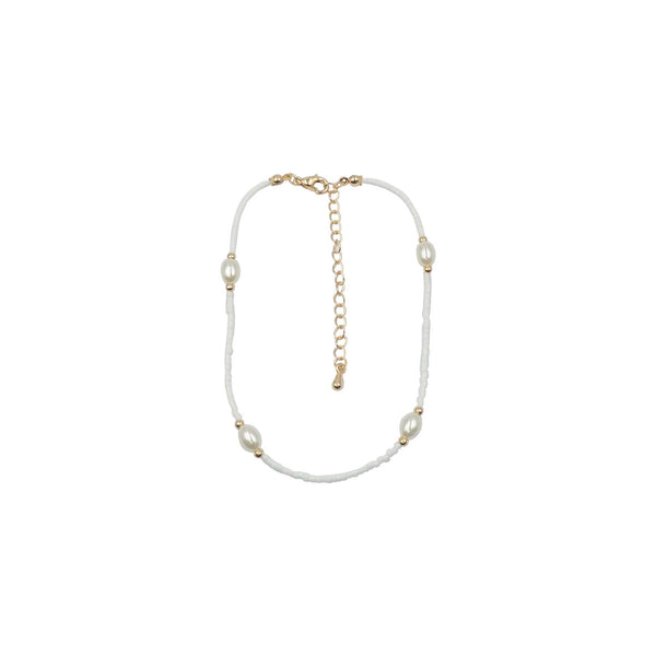 White seed bead and pearl anklet with adjustable gold chain closure on a white background