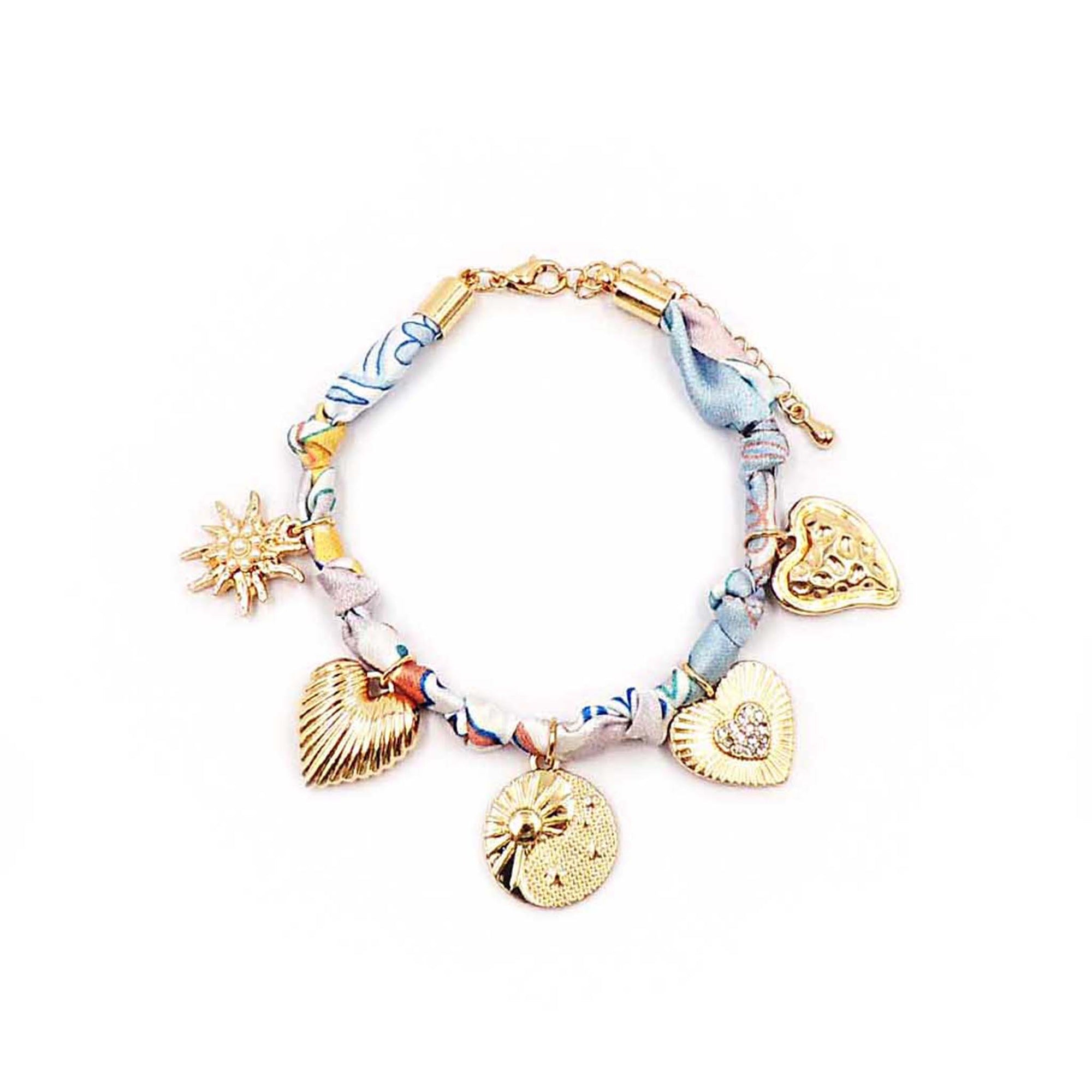 Blue and coral scarf-style bracelet with gold charms shaped like hearts, a palm tree medallion, and a sunburst, finished with an adjustable gold chain clasp.