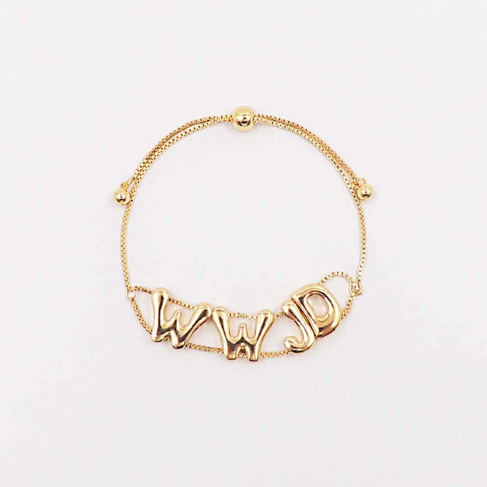 Gold adjustable chain bracelet featuring raised “WWJD” letters in polished gold-tone finish.