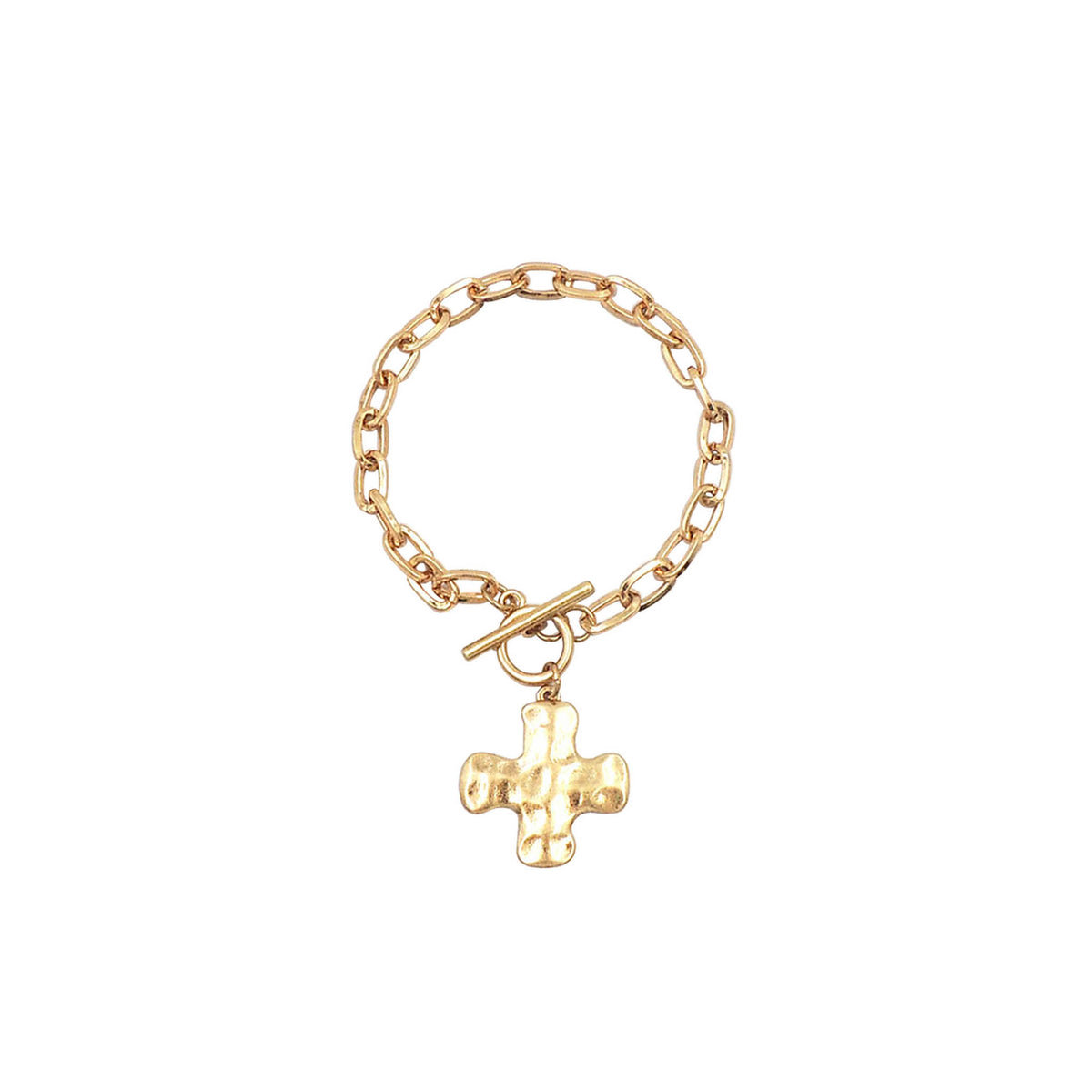 Gold chain link bracelet with toggle clasp and hammered cross pendant displayed on a white background.