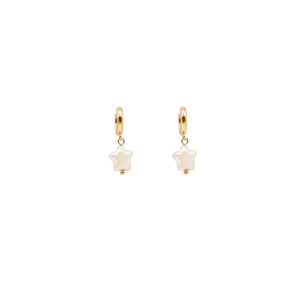 Gold hoop earrings with star-shaped pearl charms on a white background