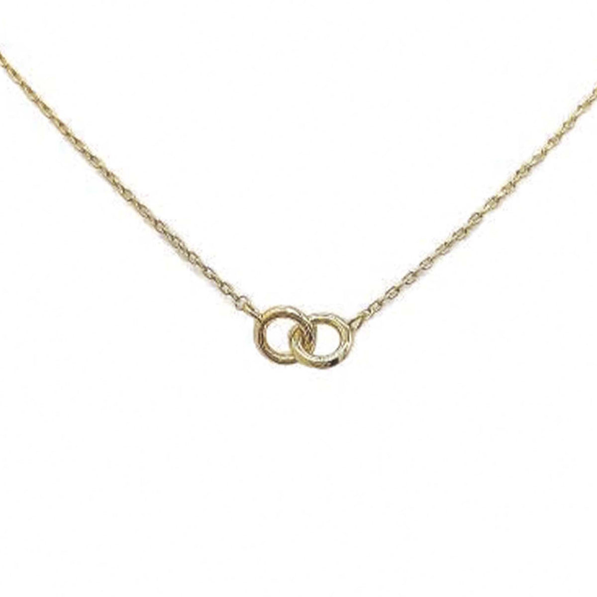 Gold necklace with two interlocking circle pendants on a delicate chain.