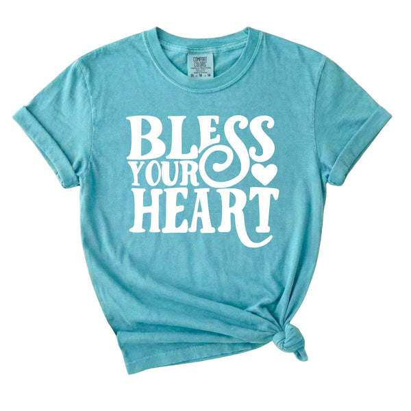 Chalky mint graphic t-shirt with white “Bless Your Heart” text and heart detail printed on the front.