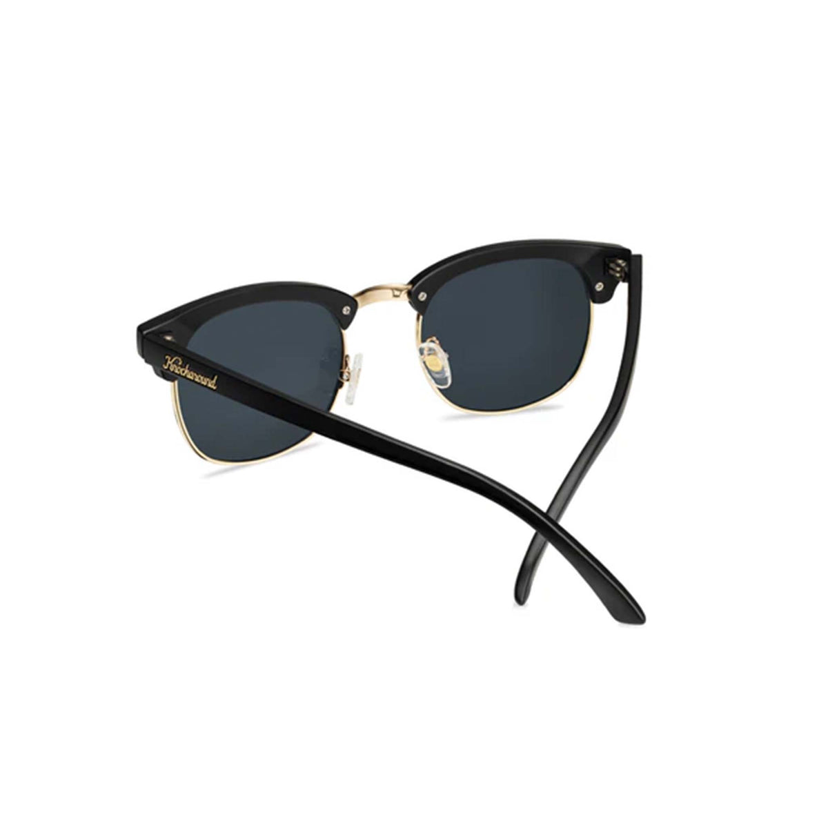 Back view of black and gold sunglasses
