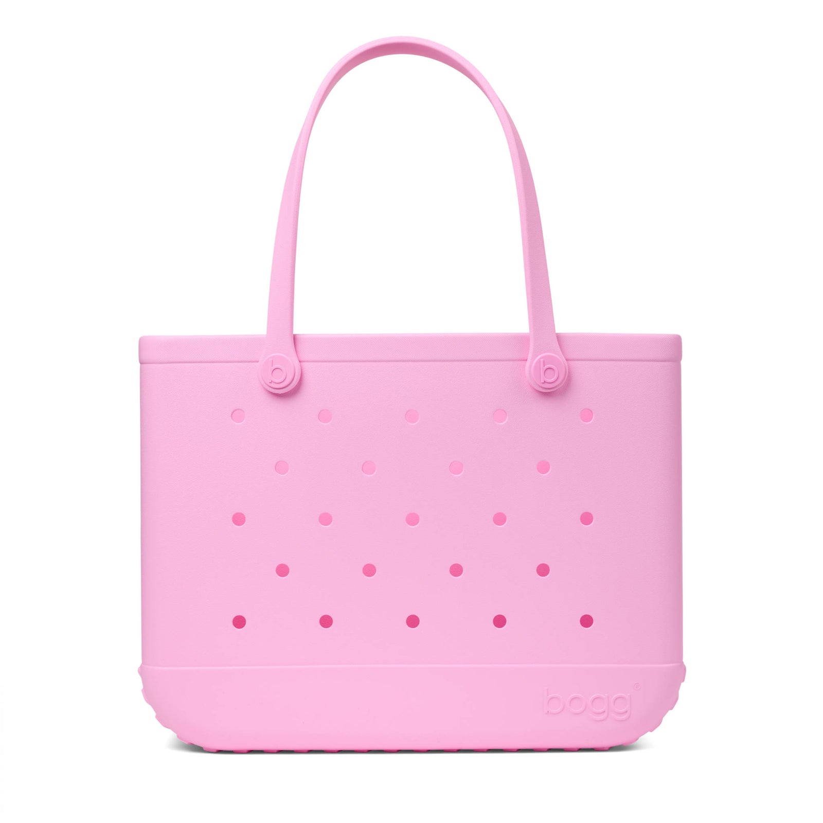 Pink Original Bogg Bag with handles raised shown in front of a white background.
