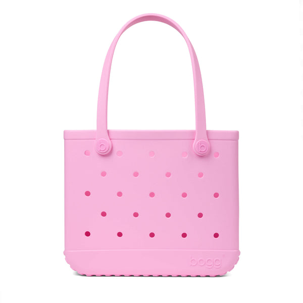 Baby Bogg Bag in Pink Taffy with handles raised shown on a white background.