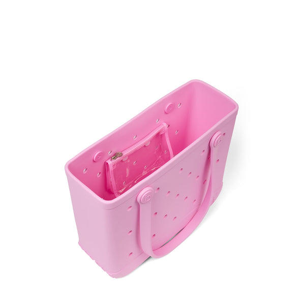 Top view of the Baby Bogg Bag in Pink Taffy showing the interior and included zipper pouch shown on a white background.