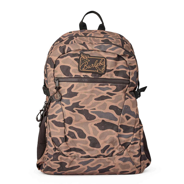 Burlebo Backpack in Guage Camo shown upright with front zip pocket, top handle, mesh side pockets, and logo patch on the front.