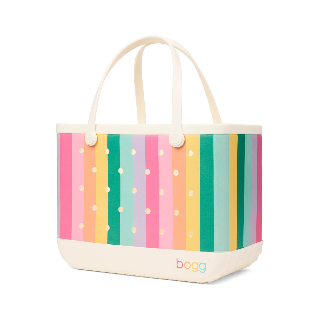 Angled view of pastel rainbow striped Bogg Bag with cream handles and structured waterproof design.