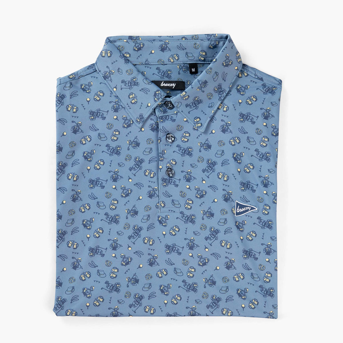 Breezy blue polo shirt with Oktoberfest-themed print neatly folded, buttons and logo displayed.