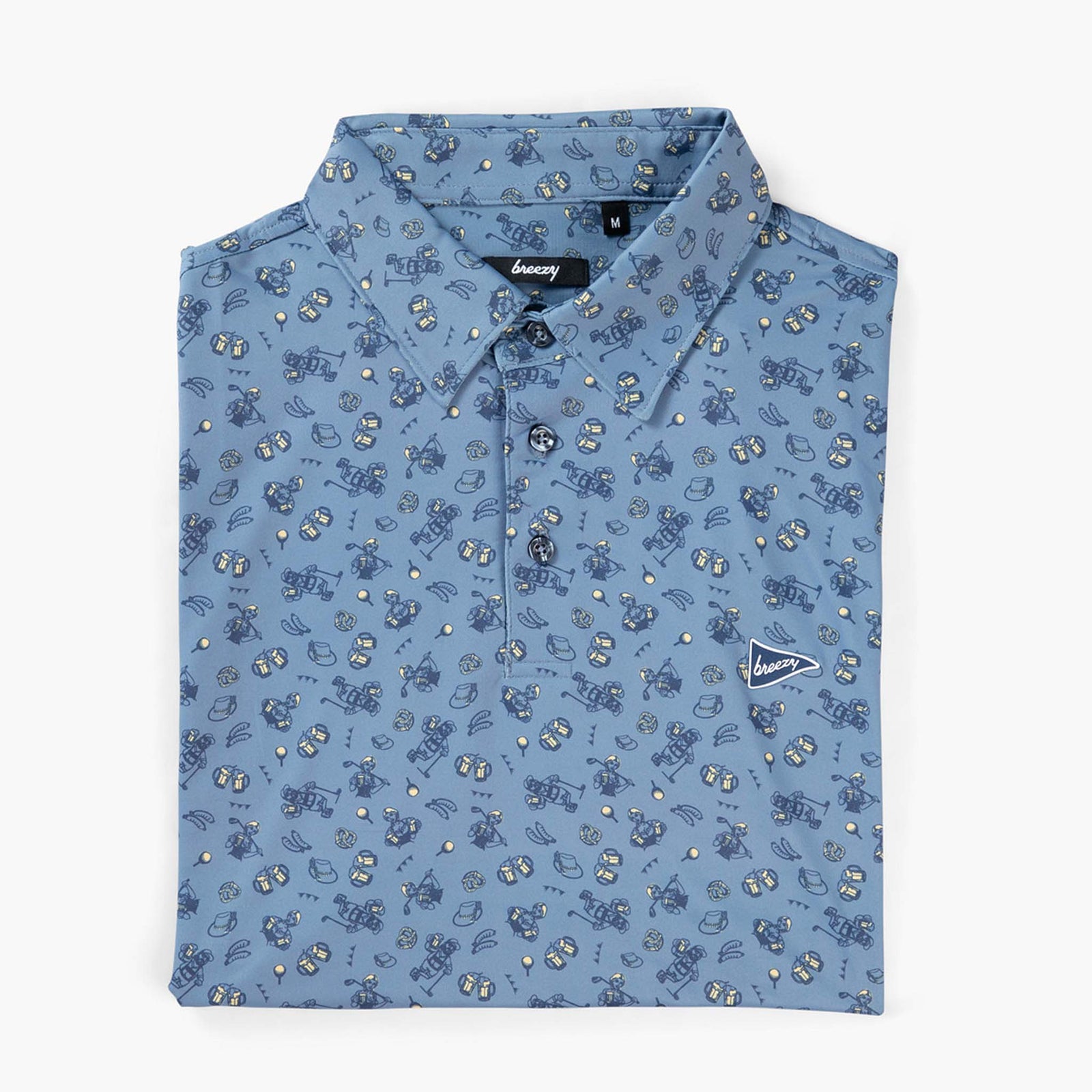 Breezy blue polo shirt with Oktoberfest-themed print neatly folded, buttons and logo displayed.