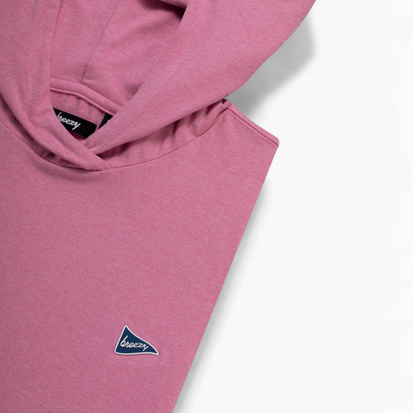 Pink long sleeve athletic wear hoodie with a small breezy logo on a white background