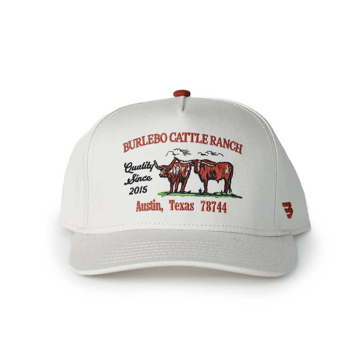 White cap with red and black Cattle Ranch text and graphics shown on a white background