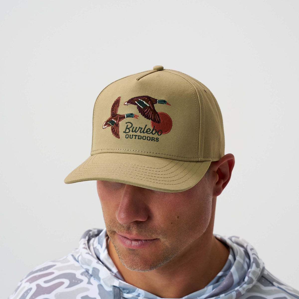 Tan hat with mallard duck design and 'Burlebo Outdoors' logo on a white background